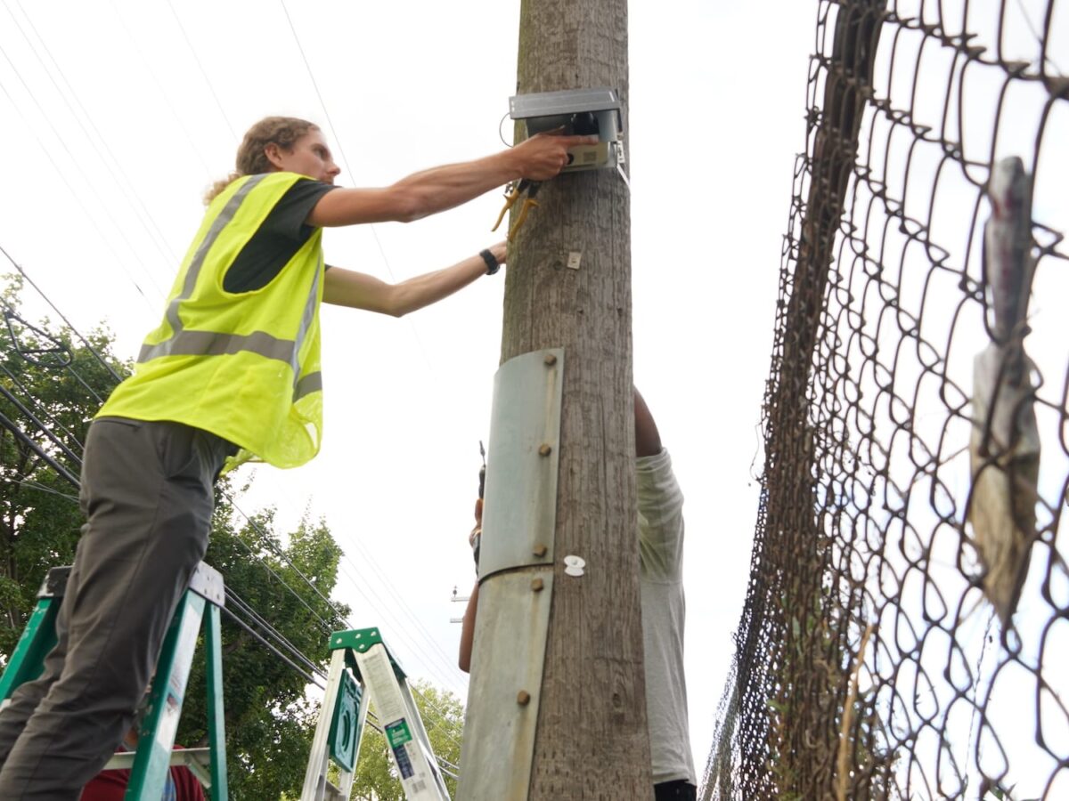 Nate Rauh-Bieri from JustAir installing air quality monitors in Dearborn. Credit: City of Dearborn.