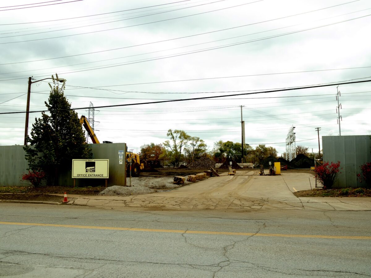 A scrapyard with fugitive dust trackout in Detroit.