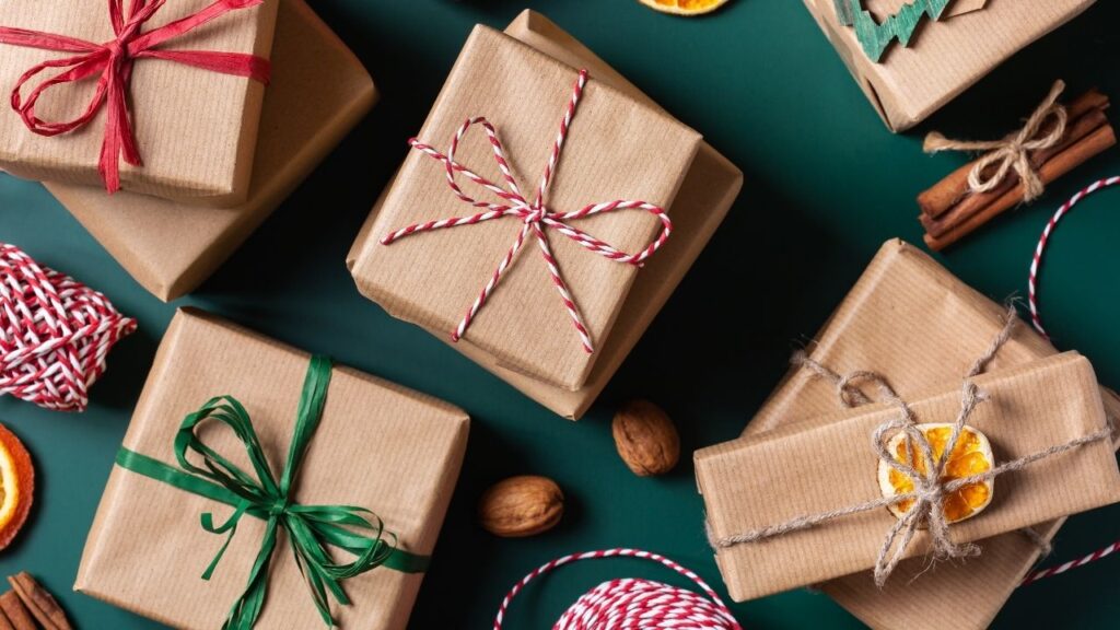 Gifts wrapped in brown paper and wrapped with string.