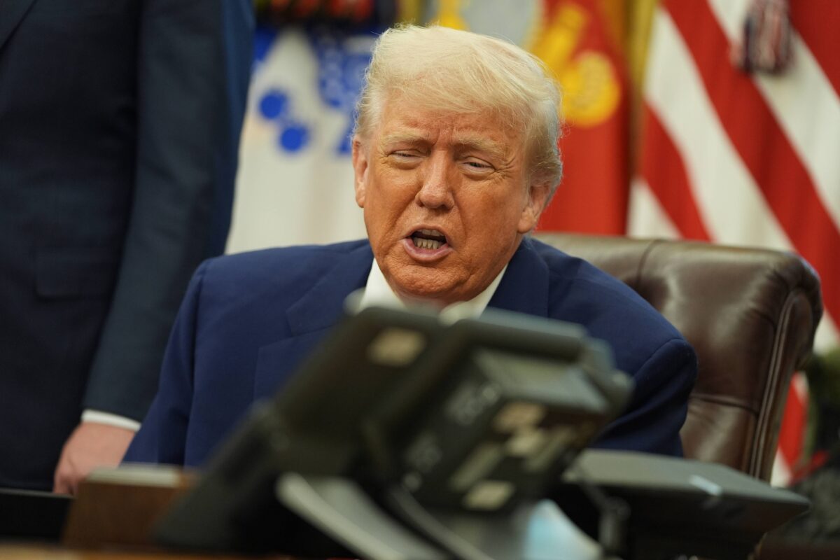 President Donald Trump speaks with British Prime Minister Keir Starmer on a phone in the Oval Office.