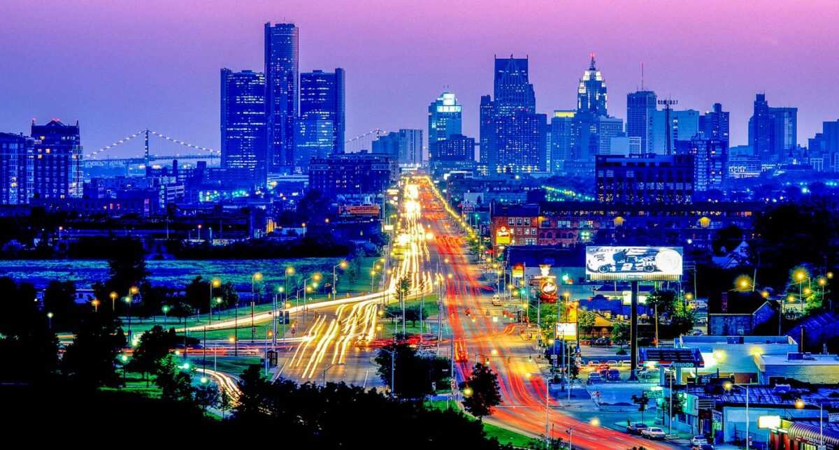 Nighttime view of Detroit looking west as traffic flows on Jefferson Avenue.