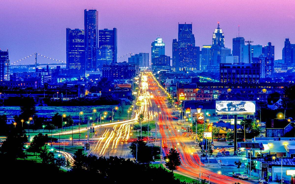 Nighttime view of Detroit looking west as traffic flows on Jefferson Avenue.