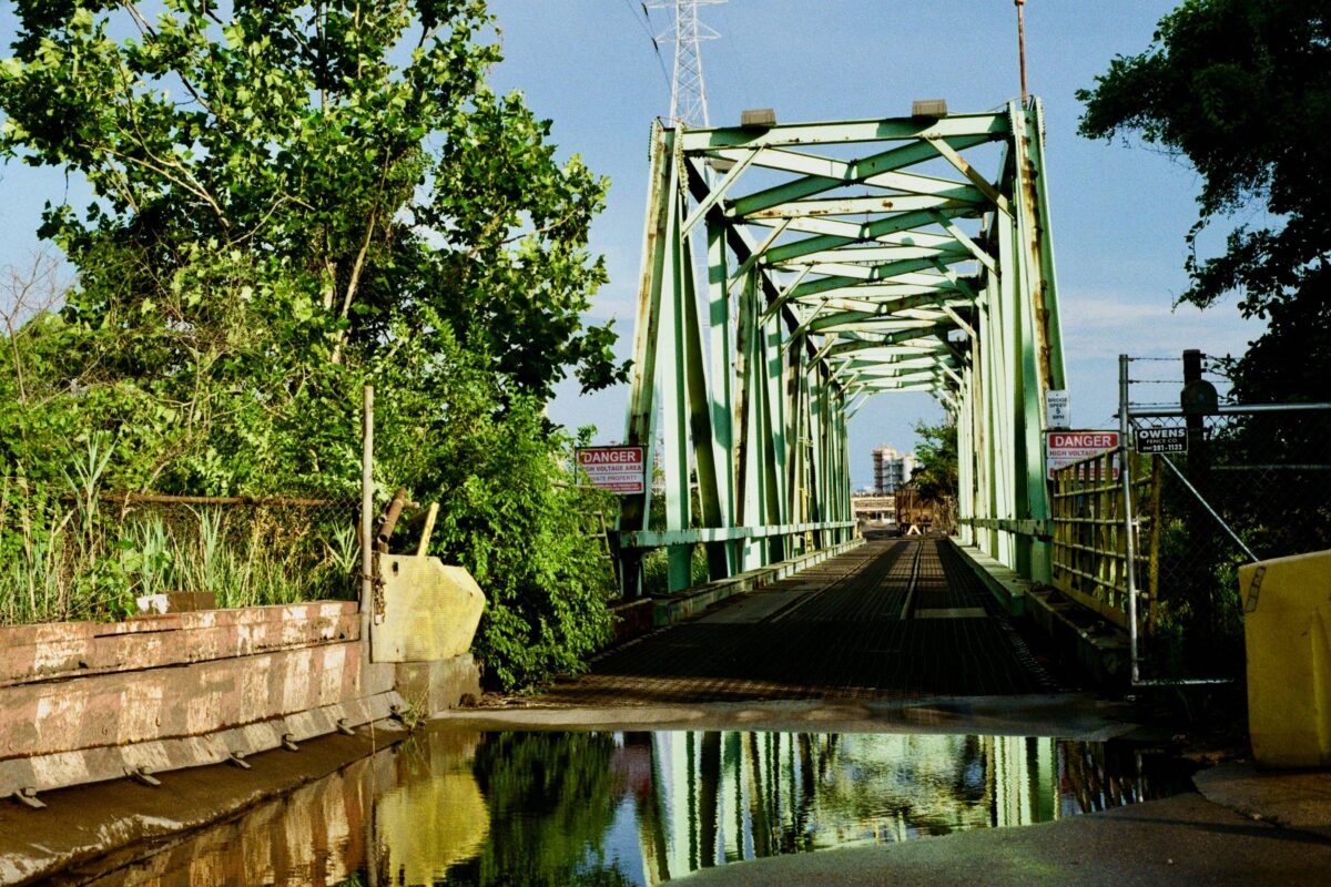 A green bridge to Detroit's industrialized Zug Island.