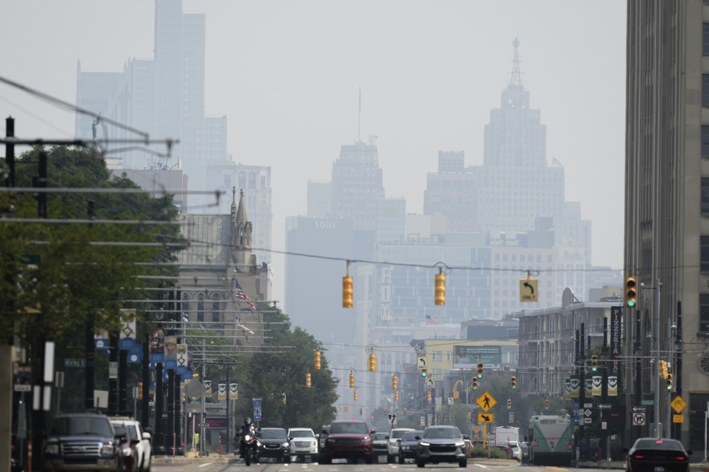 Smoke from Canadian wildfires blankets downtown Detroit in August 2025.