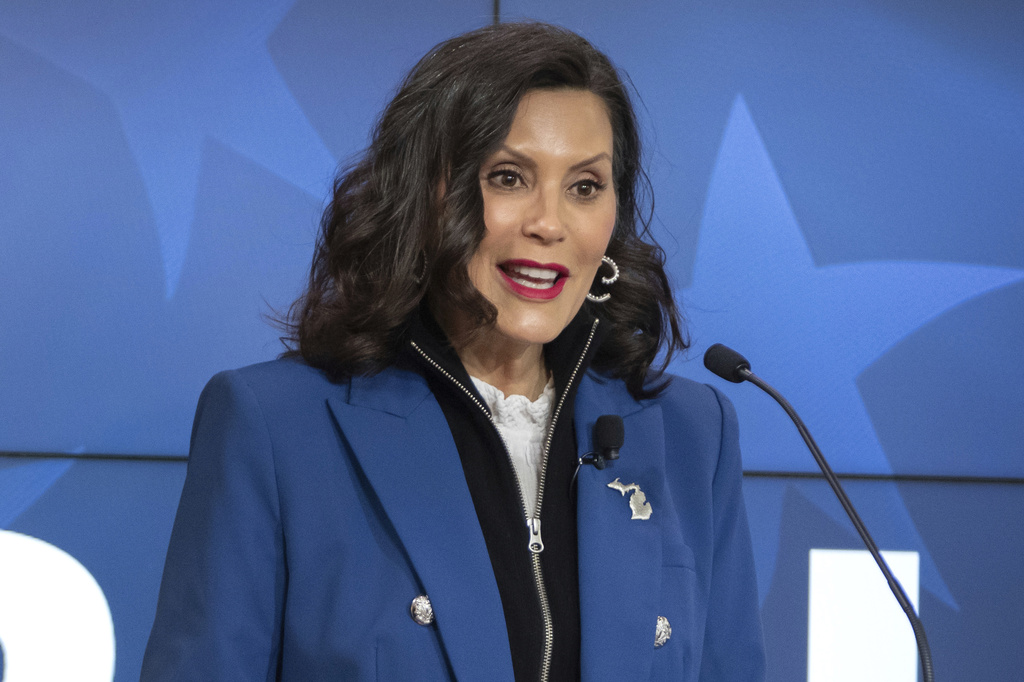 Michigan Gov. Gretchen Whitmer speaks into a microphone