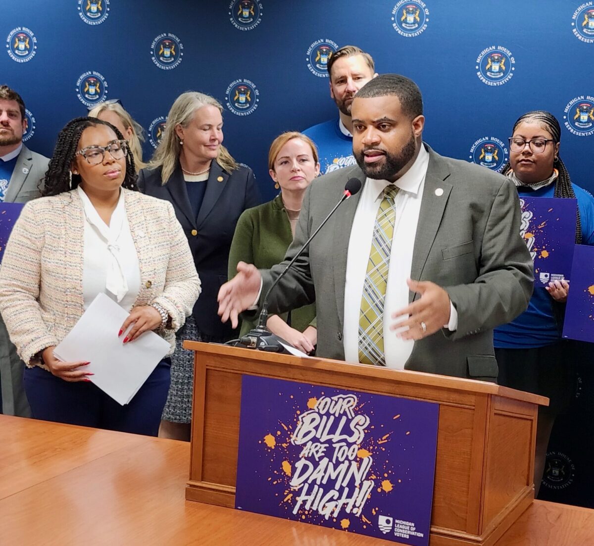Michigan State Rep. Donavan McKinney speaks from the podium at a press conference.