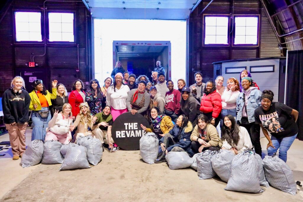 Amanda Sweet and volunteers for The ReVamp gather after an event at Big Pink in Detroit.