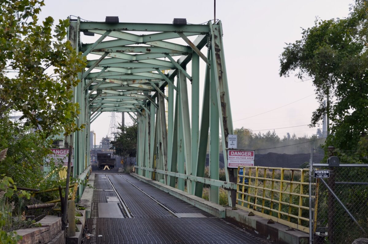 The green swing bridge on the west side of Zug Island.