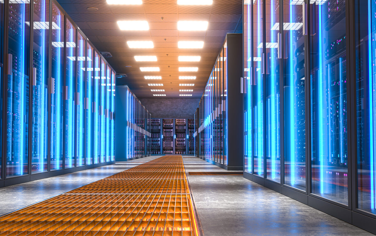 Server room with bright blue lights illuminating the corridor