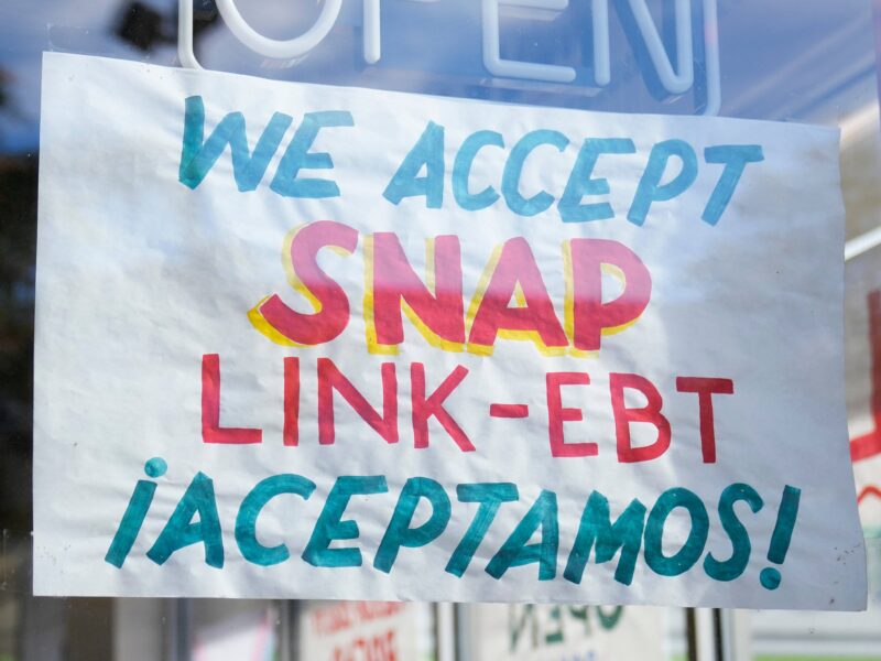 Signage showing the USDA Supplemental Nutrition Assistance Program (SNAP) is accepted is displayed at Wild Onion Market, Monday, Oct. 27, 2025, in Chicago.