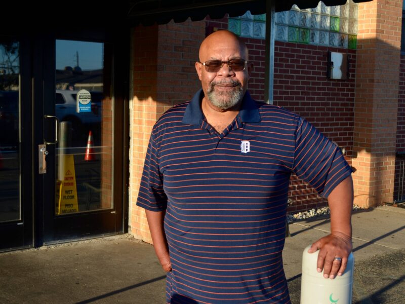 Jeffrey Jones, executive director of Hope Village Revitalization, stands in front of the Islamic Center of Detroit.