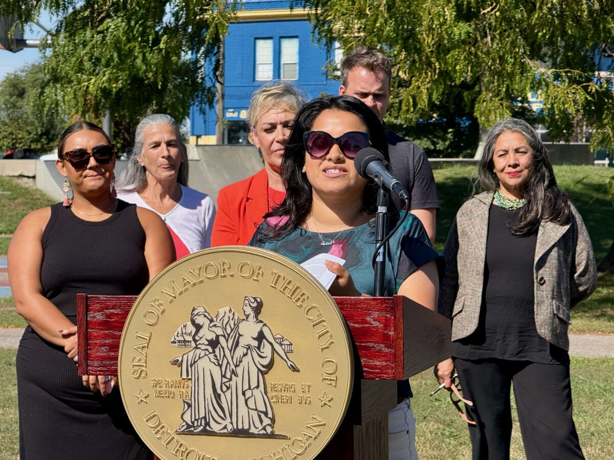 Detroit councilmember Gabriela Santiago-Romero speaks at a podium