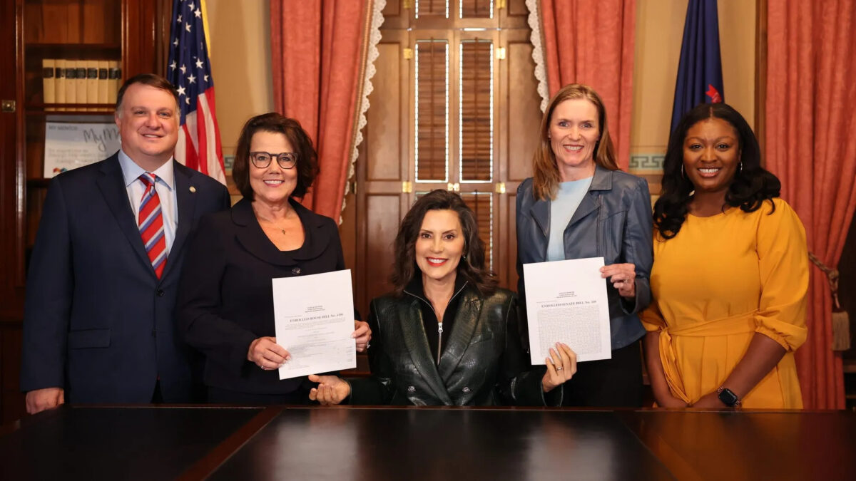 Michigan Gov. Gretchen Whitmer at budget signing with legislative leaders.