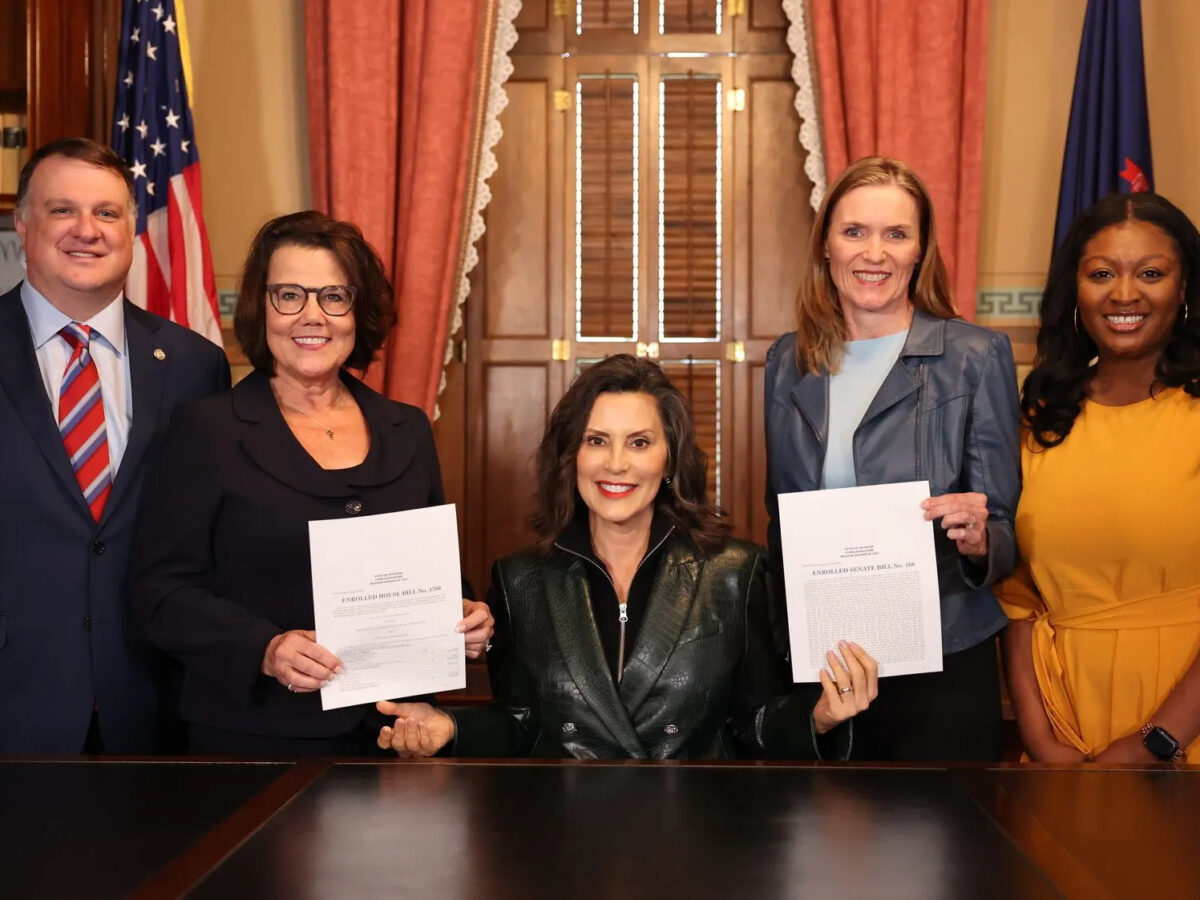 Michigan Gov. Gretchen Whitmer at budget signing with legislative leaders.
