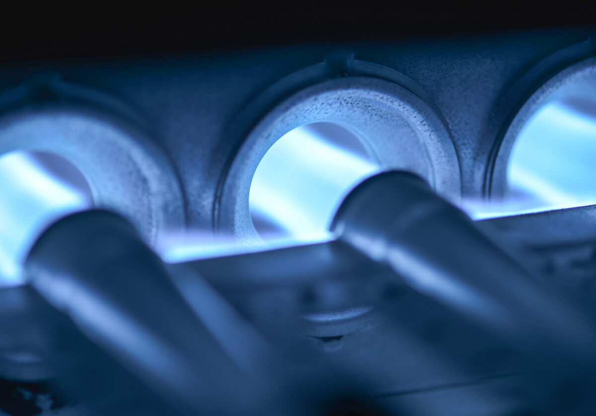 Burners on a home furnace ignite