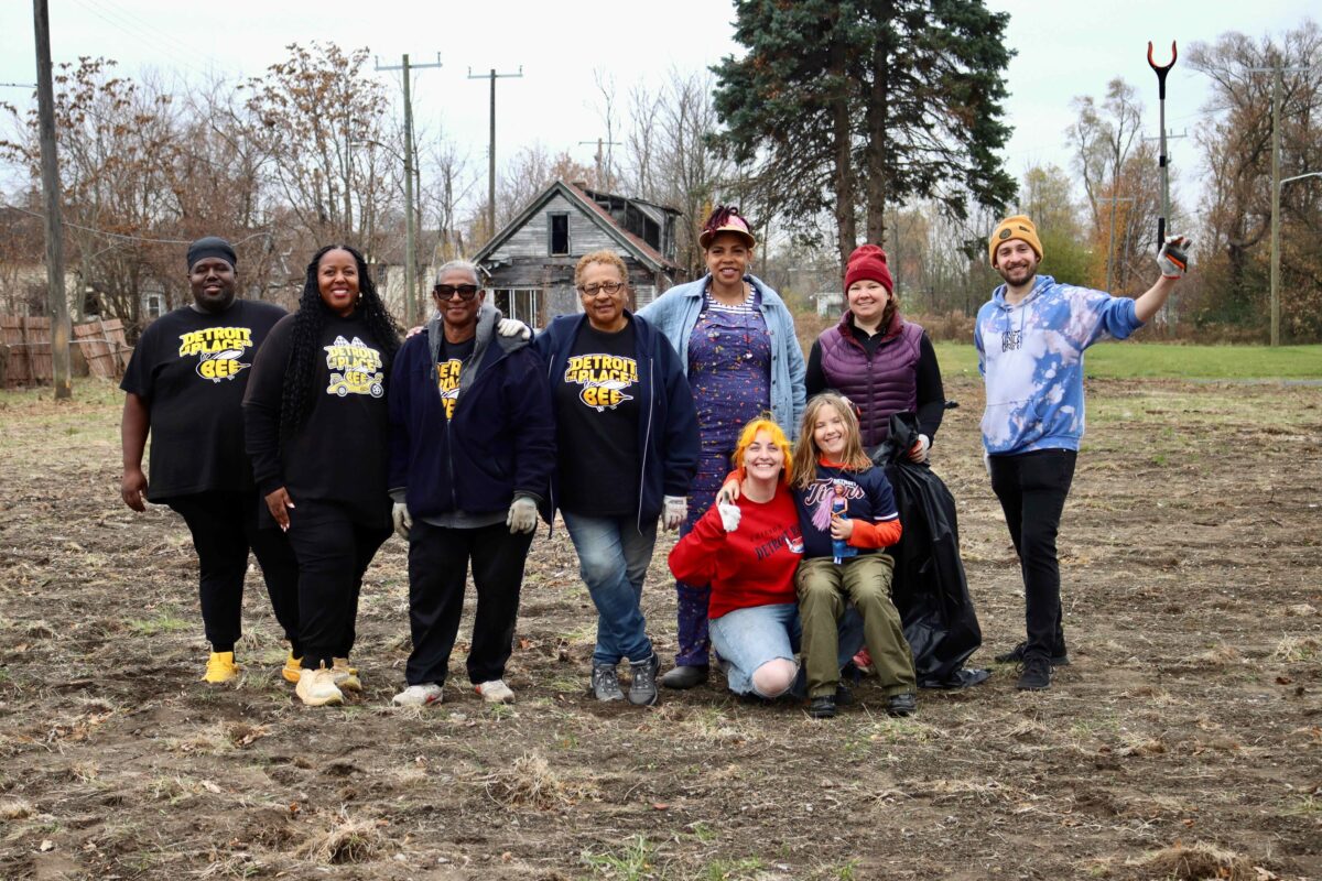 Volunteers and representatives of Detroit Hive and Earthday,org at a cleanup on East Warren Avenue.