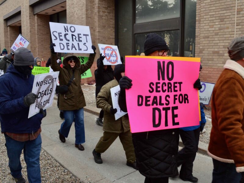 Data center protesters chant outside the windows at DTE Energy headquarters in Detroit.