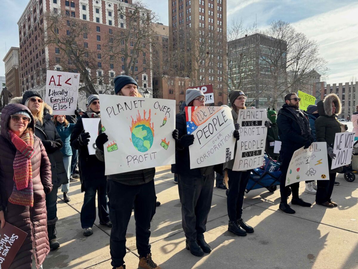 Protesters at an anti-data center rally at the Michigan Capitol.