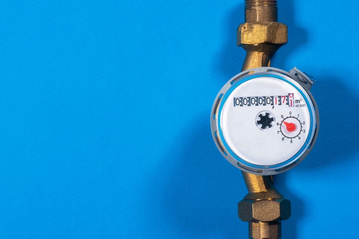 Water meter on blue background