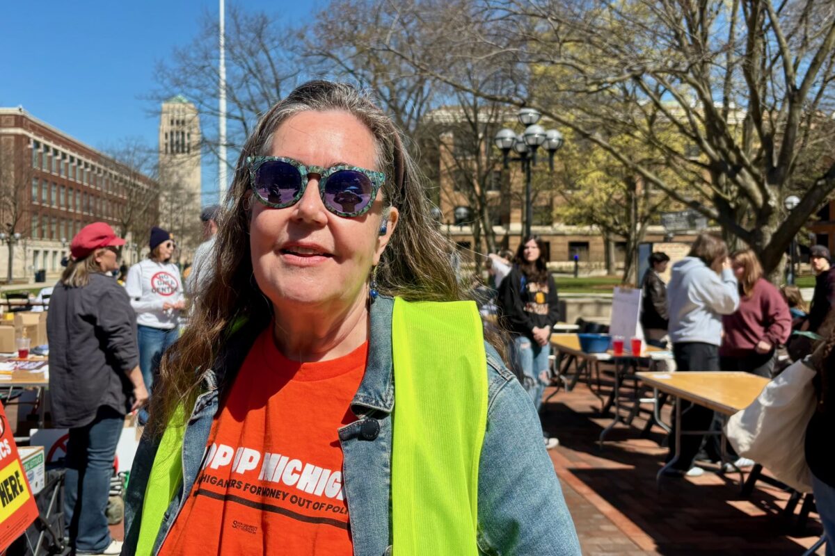 MMOP volunteer Lauren Sargent at an Ann Arbor anti-data center rally