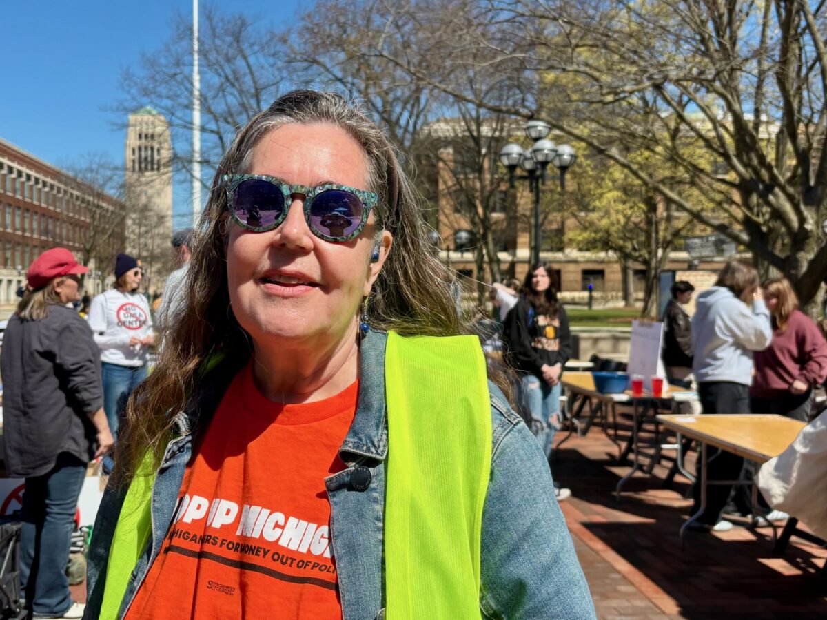 MMOP volunteer Lauren Sargent at an Ann Arbor anti-data center rally