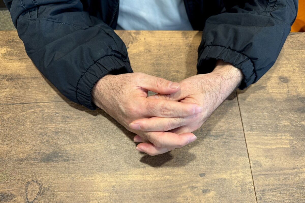 The hands of an Afghan asylum seeker