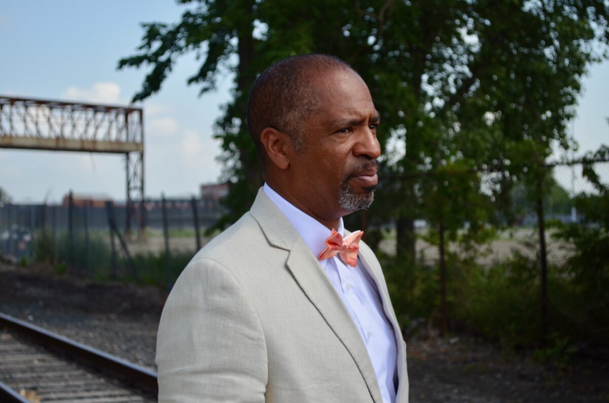 Detroit City Council Member Scott Benson stands outside the Packard Plant site.