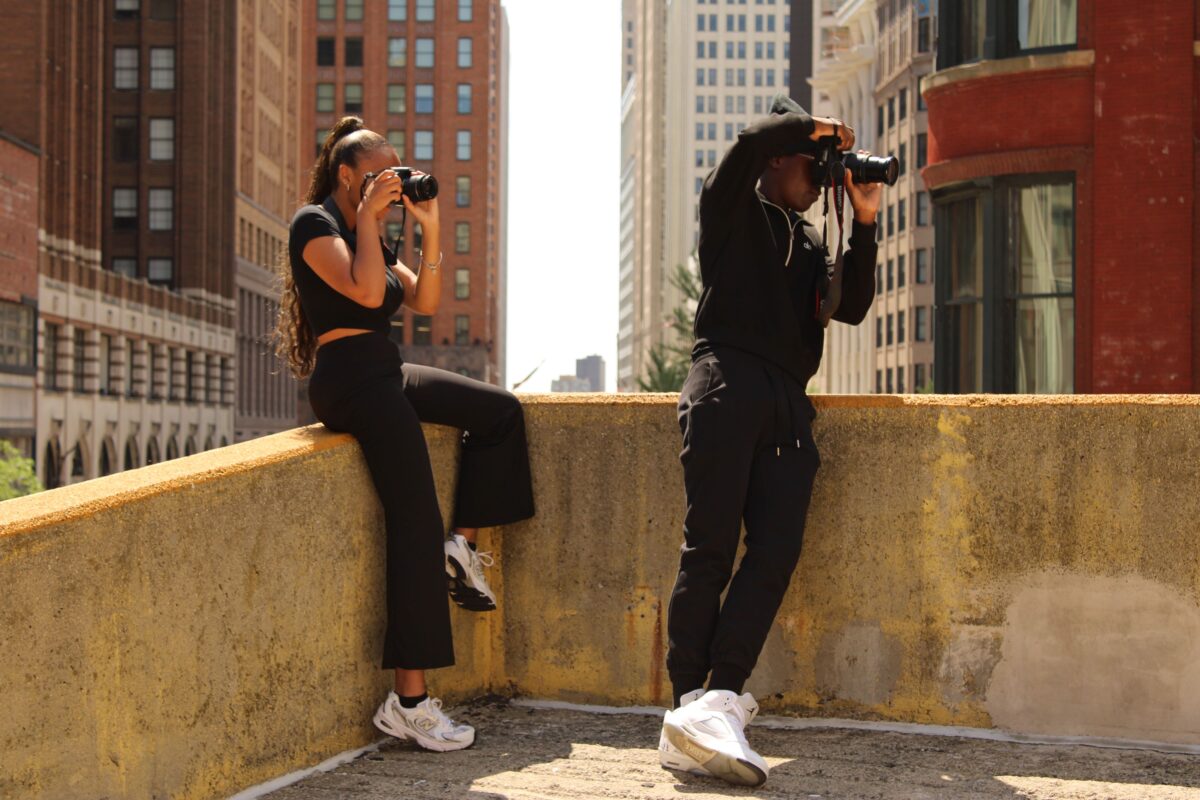 Cass Tech High School students Lauren Looney and Lawrence Fears III participate in Coaching Detroit Forward's summer photography camp.